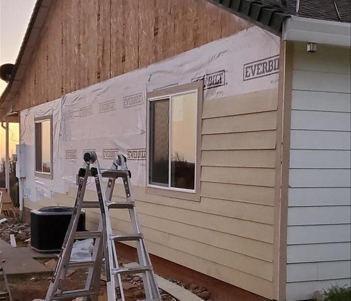 House with half siding complete