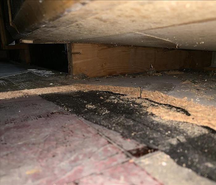 flooring underneath the cabinets