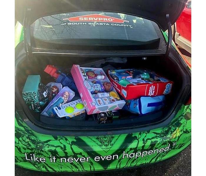 A car trunk full of toys for the toy drive